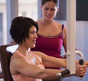 Woman on exercise machine